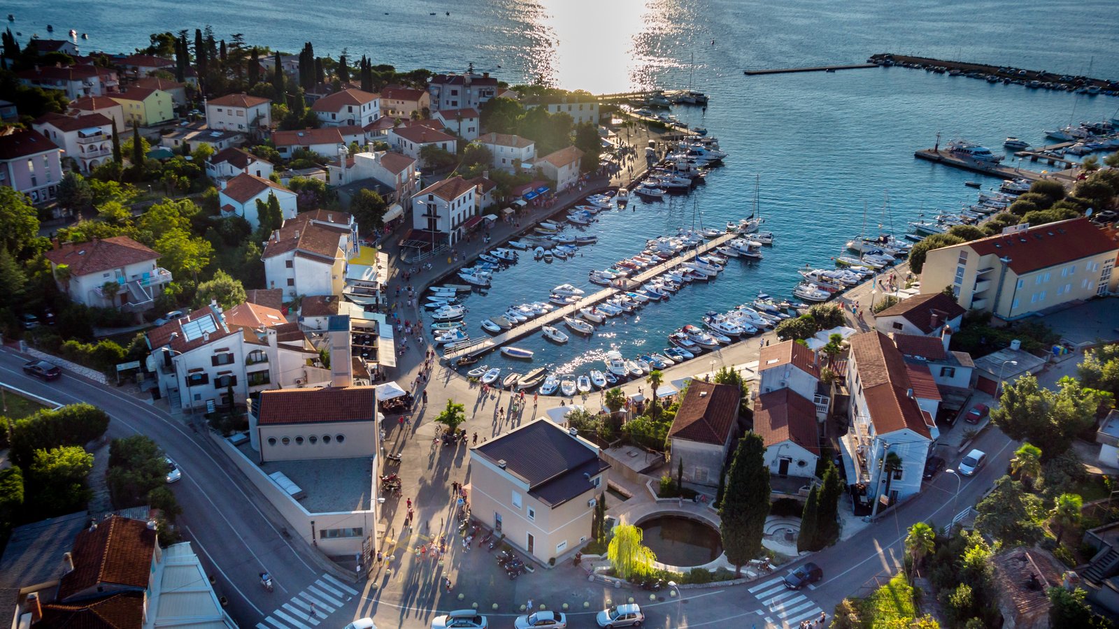 Aerial view of Malinska harbour in the evening sun