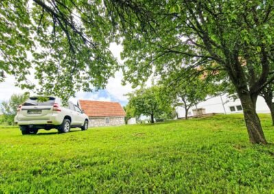 Parking beside the orchard at Grga's Villa