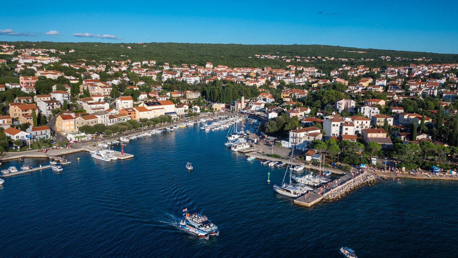 Aerial view of boats entering Malinska harbour