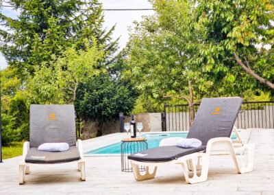 Two sun loungers on the pool terrace