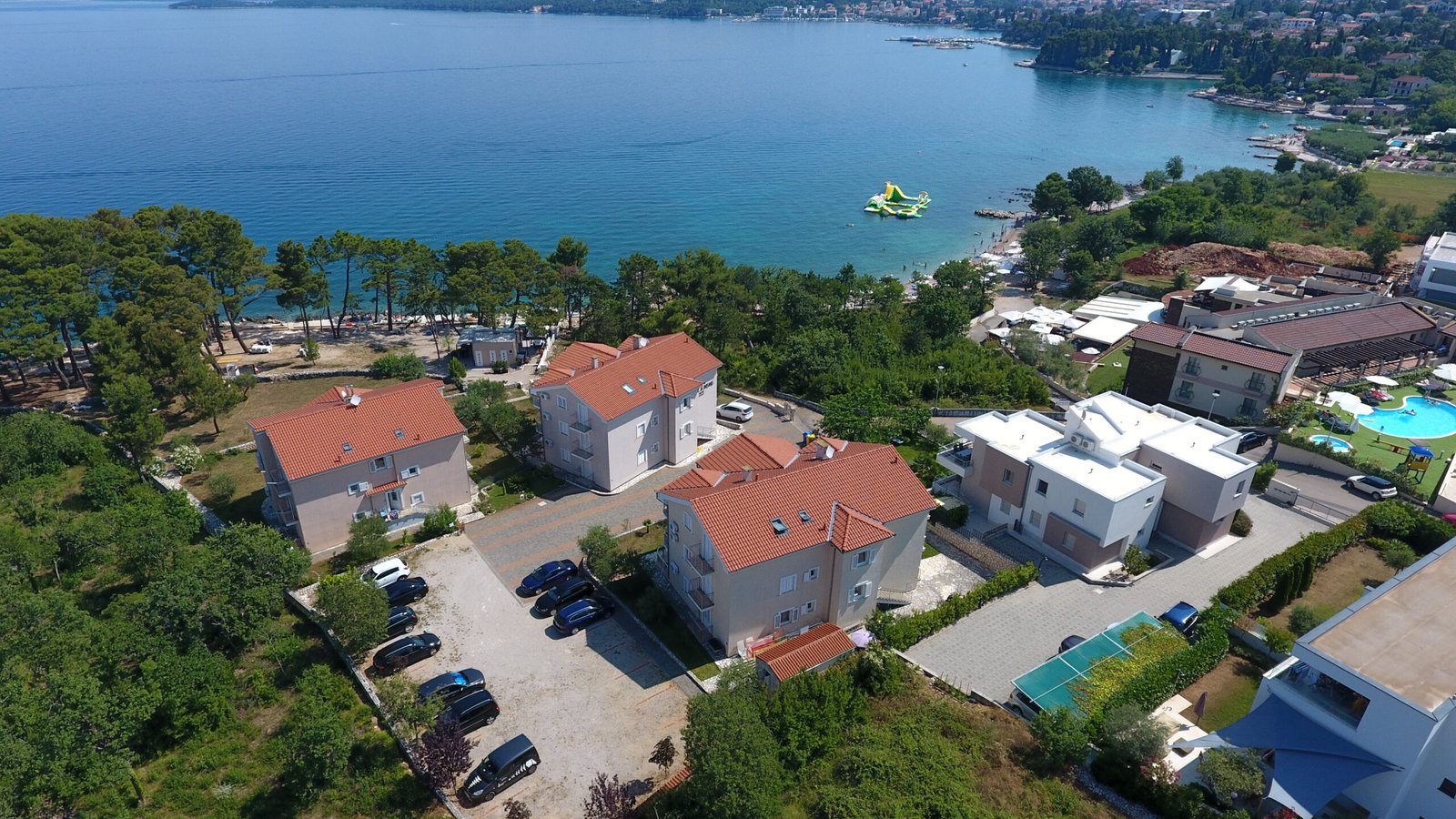Mare & Mons apartment buildings and gardens beside Rova Bay